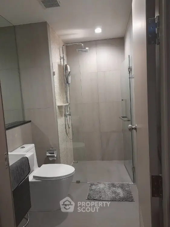 Modern bathroom with sleek shower and contemporary fixtures