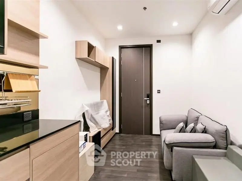 Modern living room with sleek furniture and minimalist design