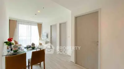 Bright and modern living room with dining area and large windows