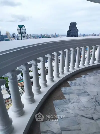 Stunning balcony with panoramic city views and elegant marble flooring, perfect for urban living.