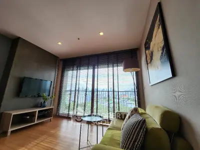 Modern living room with large windows and stylish decor