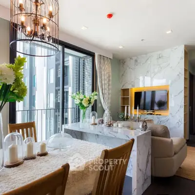 Luxurious living room with elegant decor and balcony view