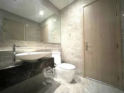 Modern bathroom with sleek fixtures and elegant marble finishes
