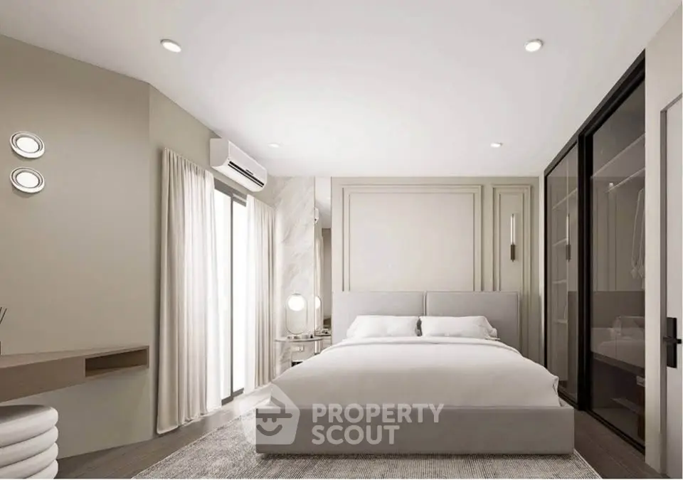 Modern bedroom with elegant design, featuring a cozy bed, stylish lighting, and a spacious walk-in closet.