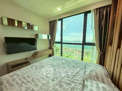 Luxurious bedroom with stunning ocean view and modern decor