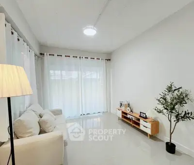 Bright and airy living room with modern decor and natural light