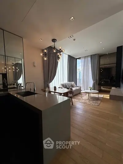 Luxurious modern living room with floor-to-ceiling windows and elegant lighting in a high-rise apartment.