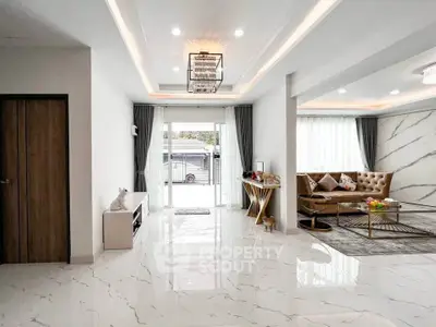 Spacious modern living room with elegant marble flooring and stylish furniture
