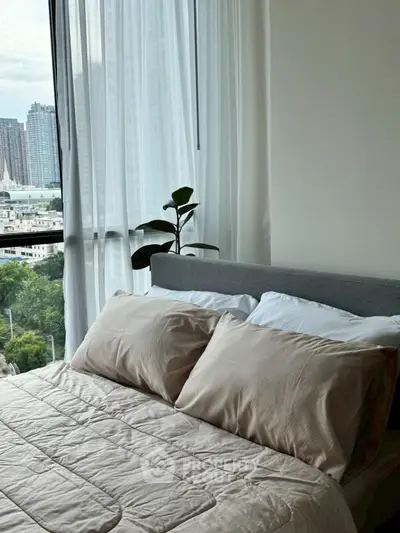 Luxurious bedroom with city view and elegant decor