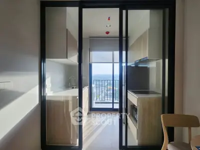 Modern kitchen with open layout and stunning balcony view