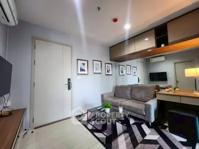 Modern living room with stylish decor and cozy seating area.