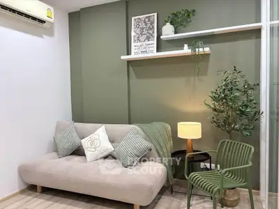 Stylish living room with modern decor, cozy sofa, and elegant lighting in a chic apartment.