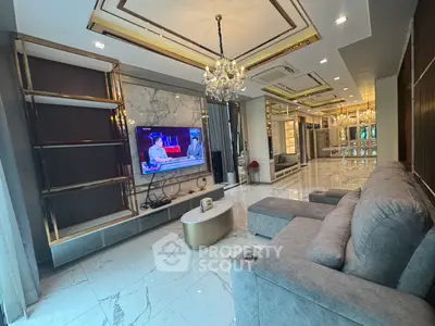 Luxurious living room with elegant chandelier and modern decor