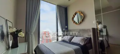 Luxurious bedroom with stunning city view and elegant decor