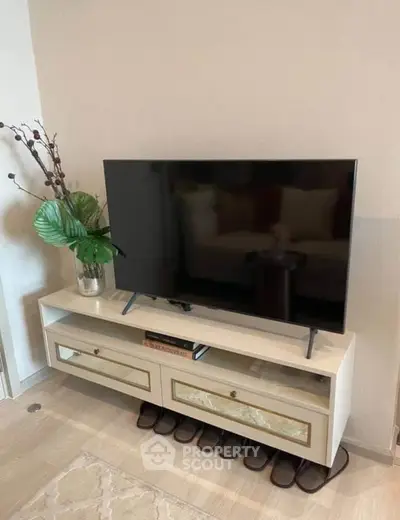 Modern living room with sleek TV stand and stylish decor
