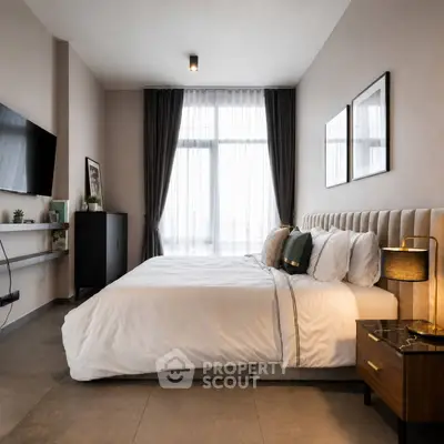 Luxurious modern bedroom with elegant decor and large window view
