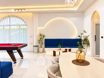 Luxurious modern living room with elegant decor and pool table