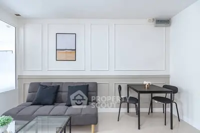 Modern living room with sleek furniture and minimalist decor