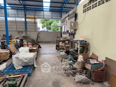 Spacious industrial warehouse with ample storage space and high ceilings, ideal for business operations.