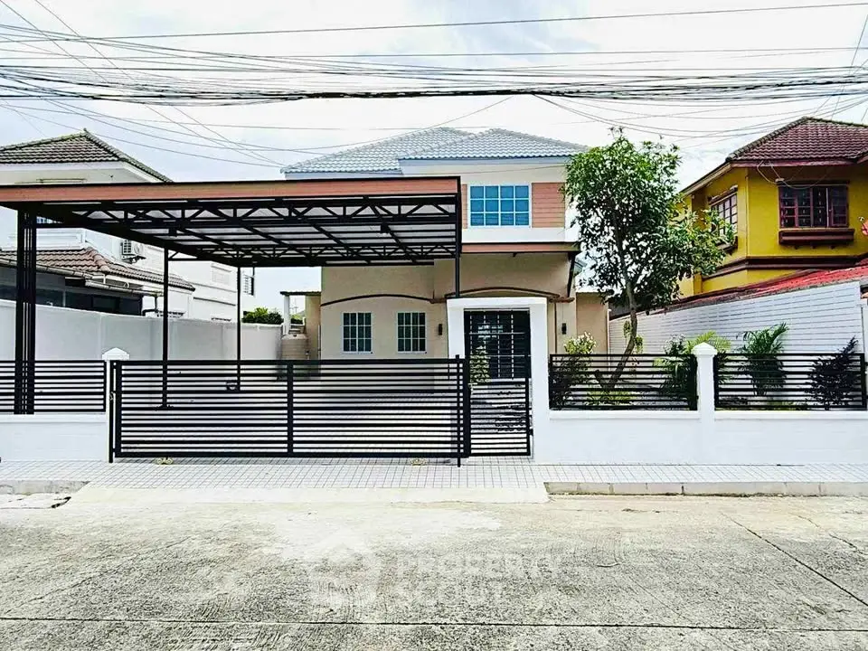 Charming suburban house with modern gate and spacious driveway