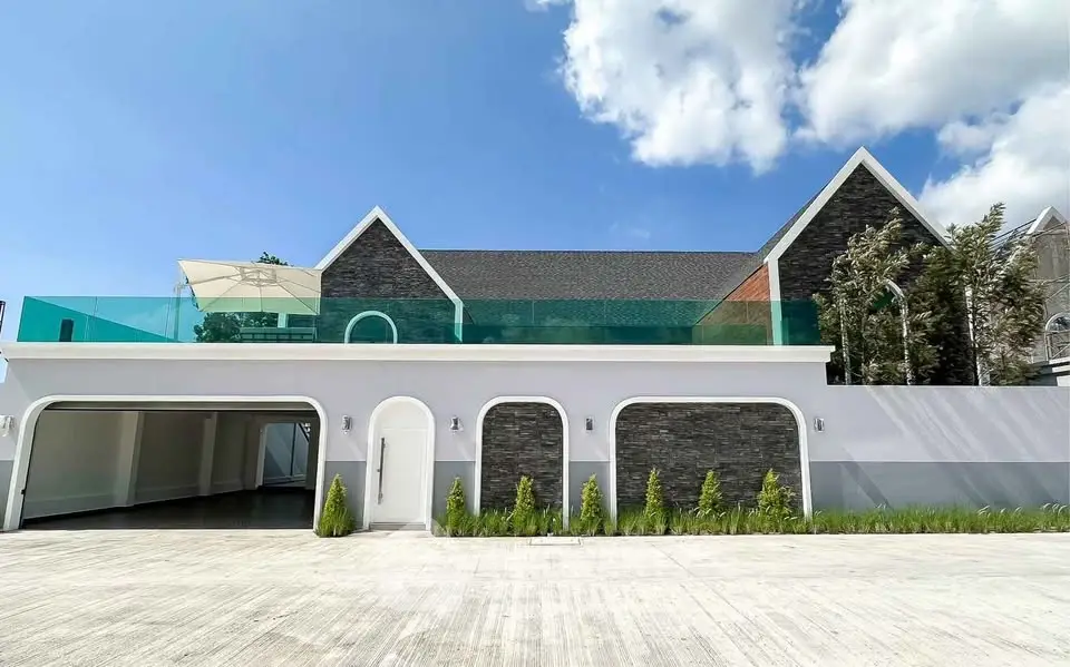 Stunning modern house exterior with sleek design and spacious garage