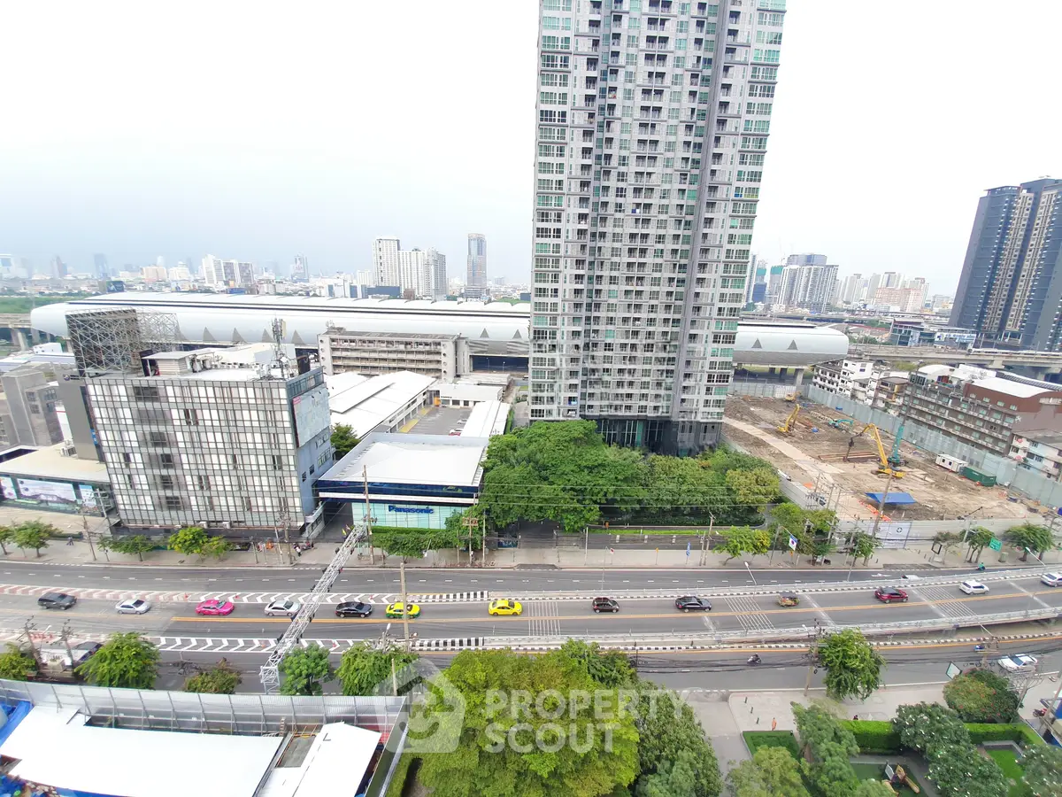 Stunning cityscape view featuring modern high-rise buildings and bustling streets, ideal for urban living enthusiasts.