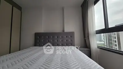 Modern bedroom with city view and stylish decor