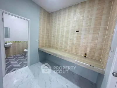 Modern bathroom with stylish tile design and spacious layout