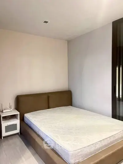 Modern bedroom with minimalist design and cozy bed