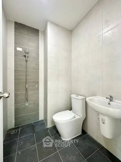 Modern bathroom with sleek shower and contemporary fixtures