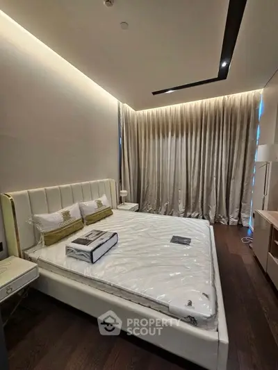 Luxurious modern bedroom with elegant lighting and stylish decor