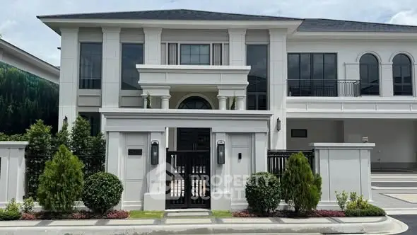 Luxurious modern mansion with elegant facade and lush landscaping