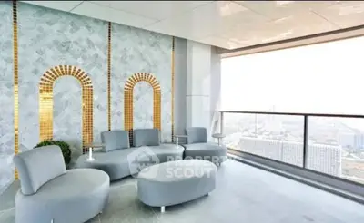 Luxurious high-rise balcony with stunning city view and modern seating area.