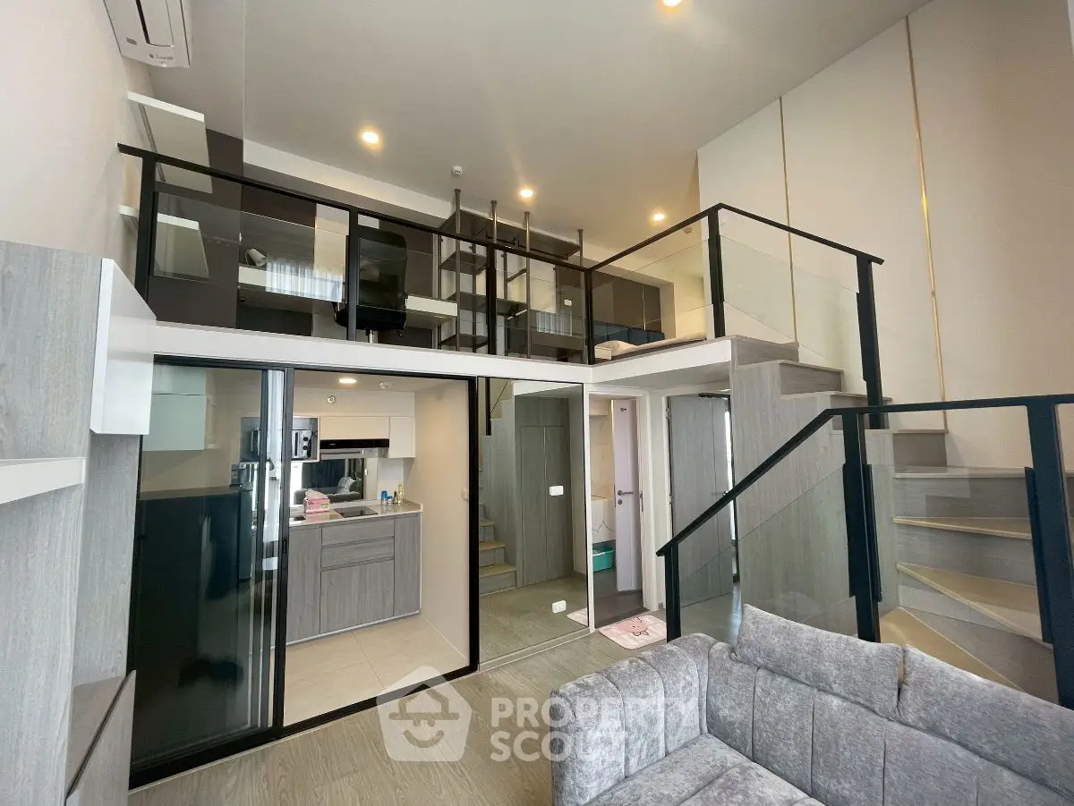 Modern loft apartment with open kitchen and stylish mezzanine