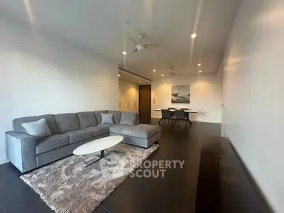 Spacious modern living room with sleek furniture and elegant decor