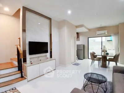 Modern living room with open layout and stylish furniture