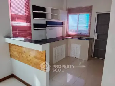 Charming kitchen with modern open layout and ample natural light.