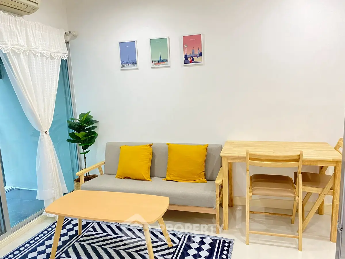 Charming living room with modern decor, cozy sofa, and vibrant accents perfect for relaxation.