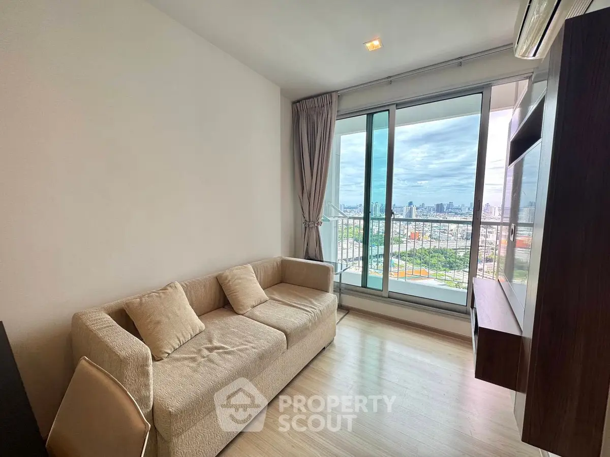 Modern living room with city view and cozy sofa in high-rise apartment