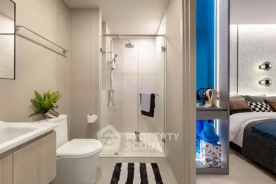 Modern bathroom with glass shower and adjacent stylish bedroom