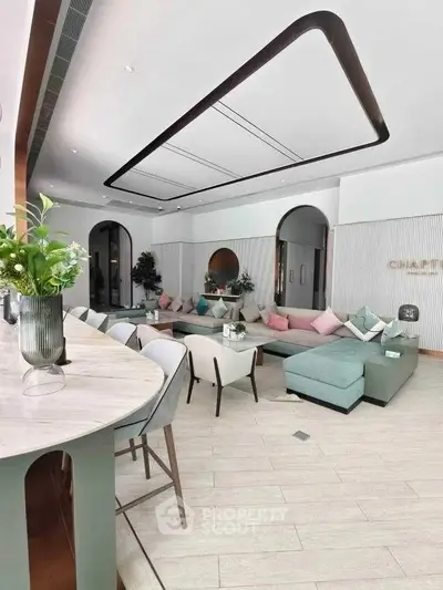 Spacious modern living room with stylish decor and cozy seating area