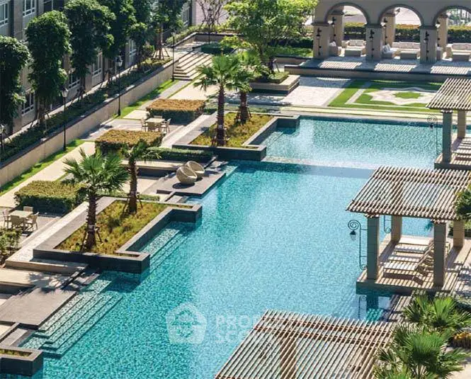 Luxurious outdoor pool area with elegant landscaping and seating, perfect for relaxation.