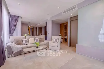 Spacious modern living room with elegant decor and natural light