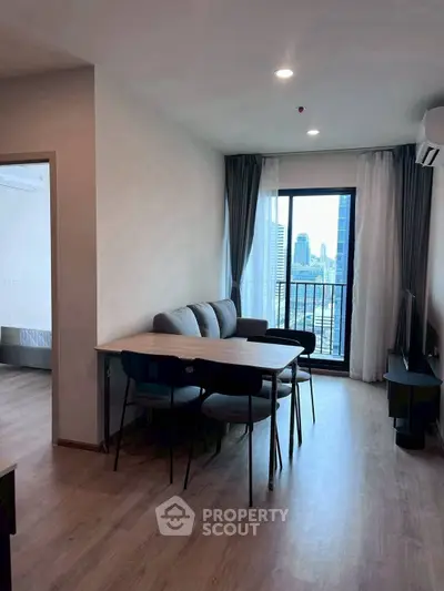 Modern living room with city view and stylish furniture