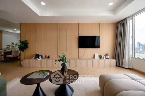 Modern living room with sleek wooden paneling and city view