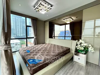 Luxurious bedroom with city view and elegant decor in modern apartment