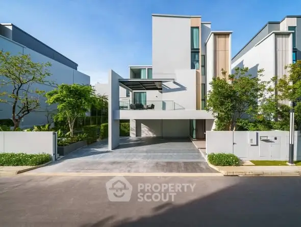 Modern luxury house exterior with sleek design and spacious driveway