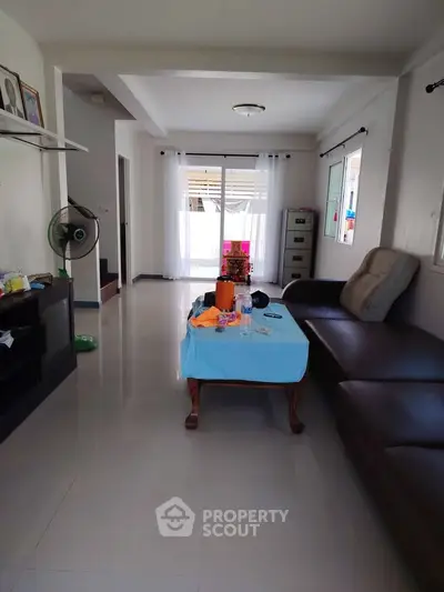 Spacious living room with modern furniture and natural light