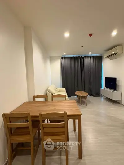 Modern living room with wooden furniture and cozy ambiance