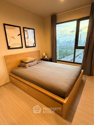 Modern bedroom with stunning city view and stylish decor